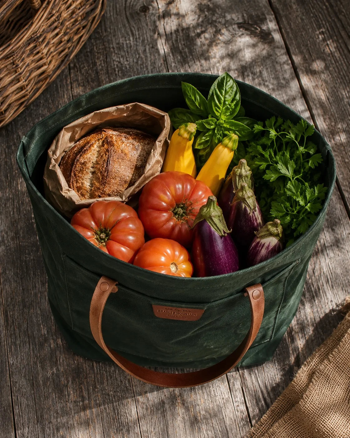 Coal Tote packed with farmers-market produce and bread.