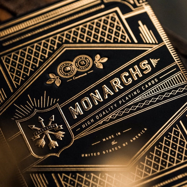Theory11 Monarchs Playing Cards — navy and gold foil box, premium 909 finish