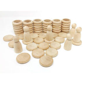 Grapat Nins, rings, and coins in natural wood, studio layout
