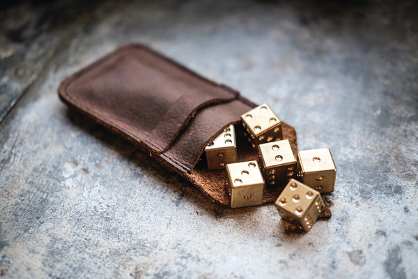 Solid brass dice set — 15mm, set of 6 with oil-tanned leather pouch