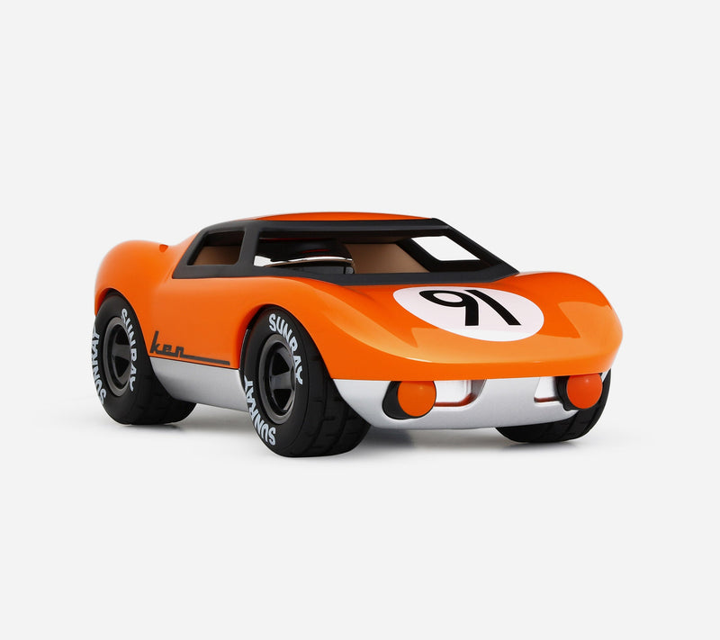Playforever Ken Gibson orange endurance racer, front three-quarter