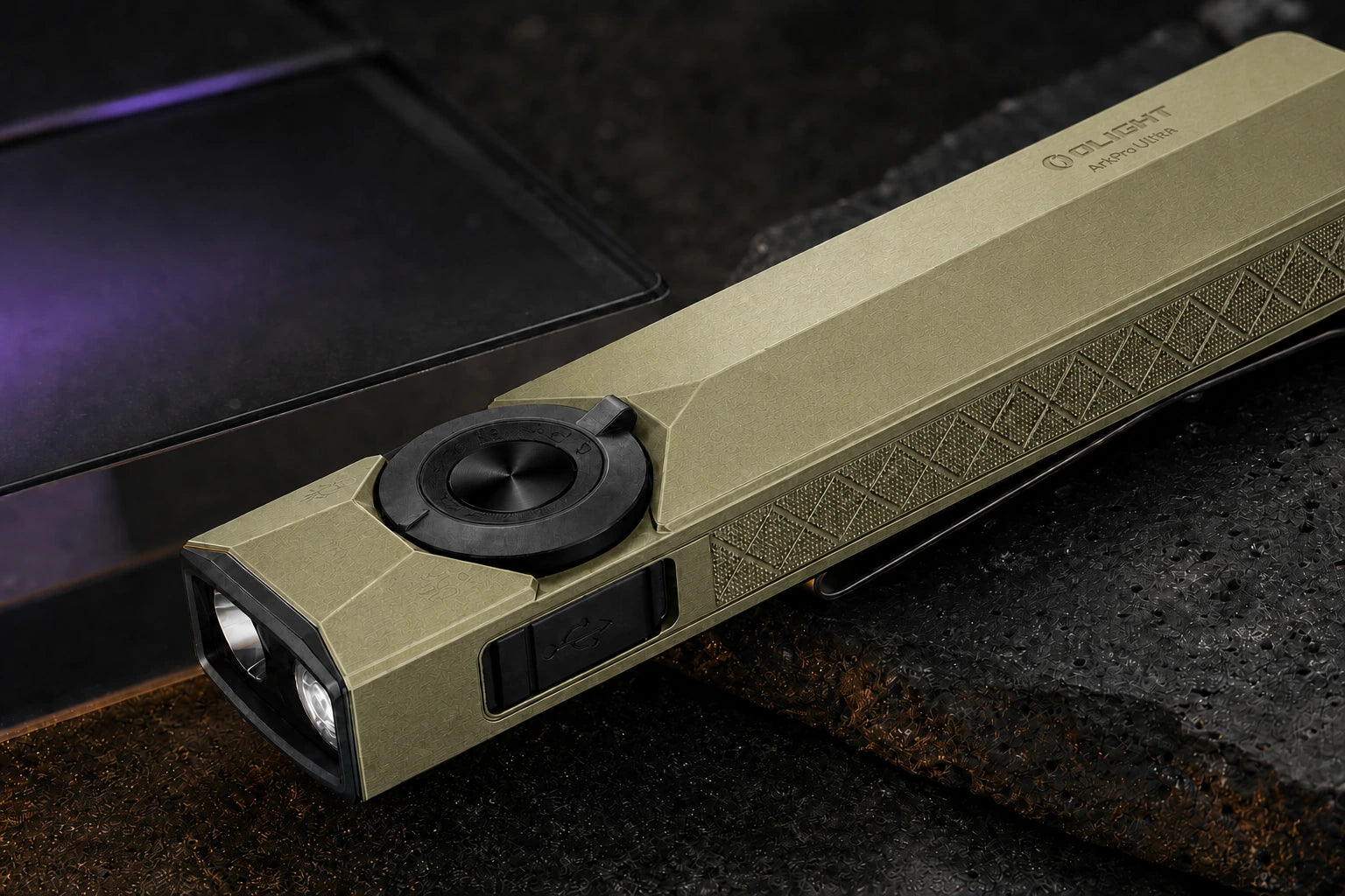 Macro view of the ArkPro Ultra rotary selector and machined olive-green body