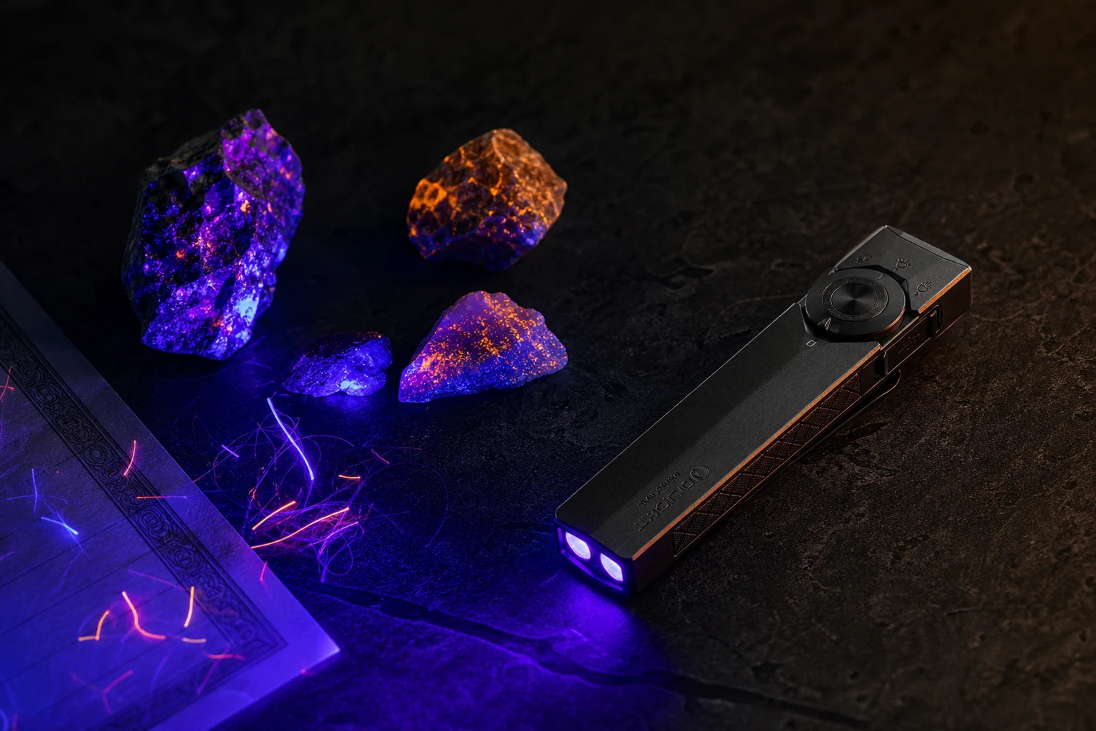 Onyx Black ArkPro Ultra revealing fluorescent minerals and security fibers with ultraviolet light