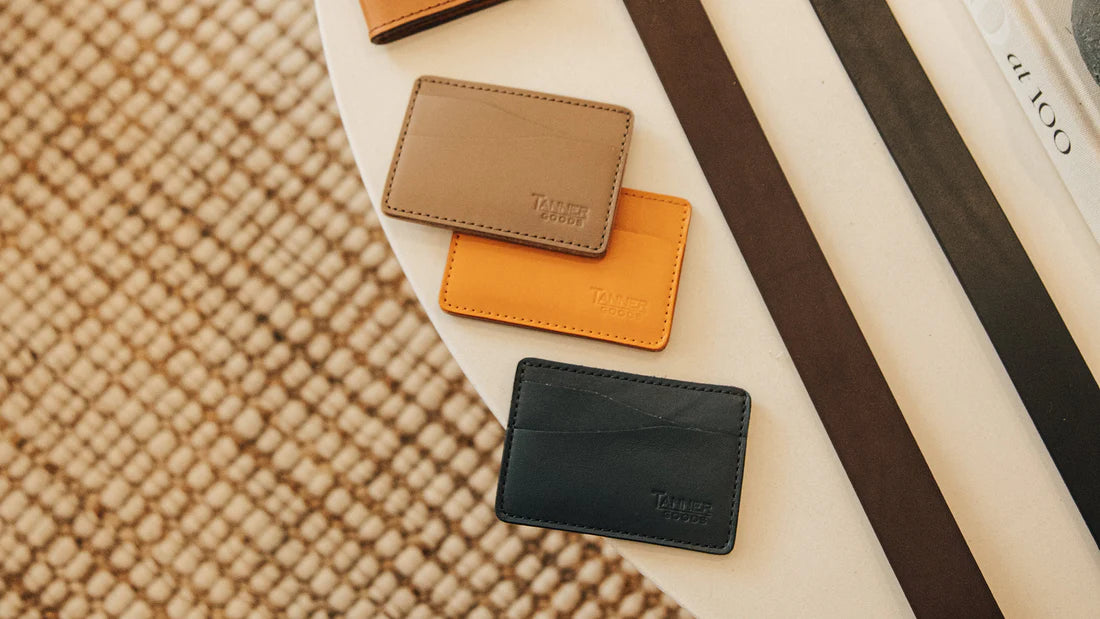 Three Journeyman cardholders arranged on a light table
