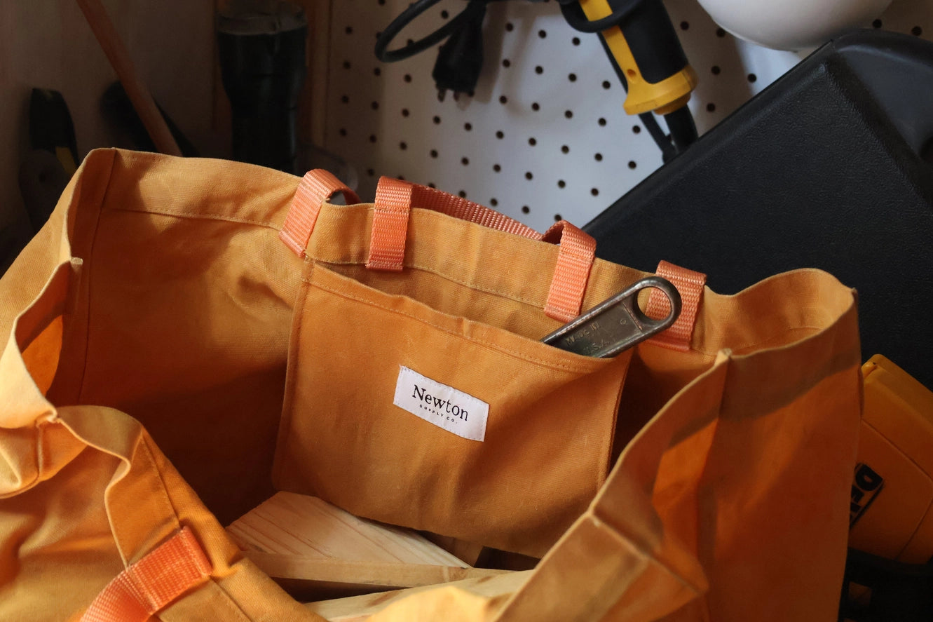 Interior close-up showing the tote's finished seams and pocket