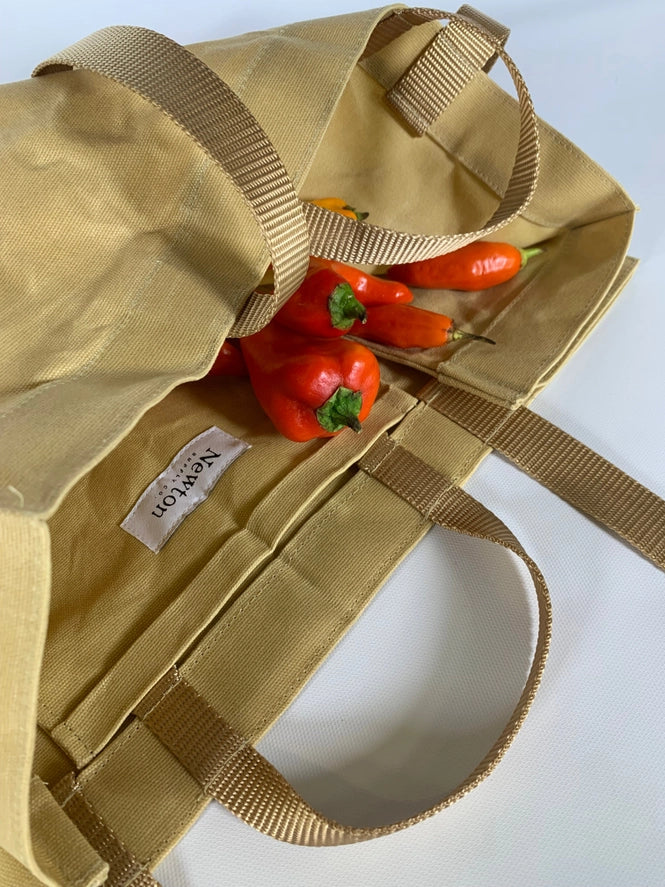 Open tote showing the interior slip pocket